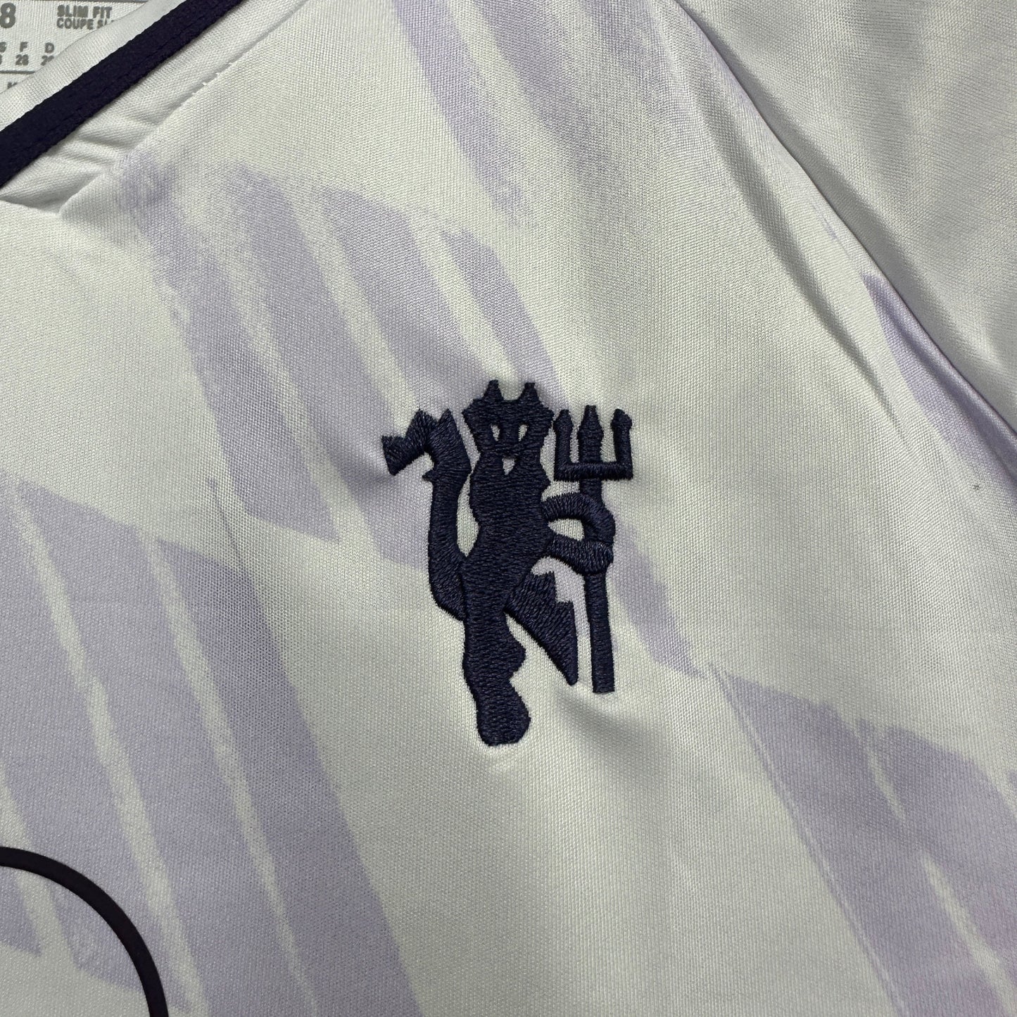 Kit Infantil Manchester United Reserva 25/26